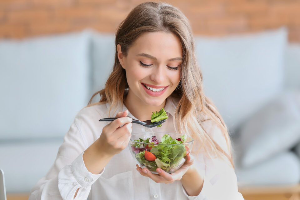 woman appreciating her salad